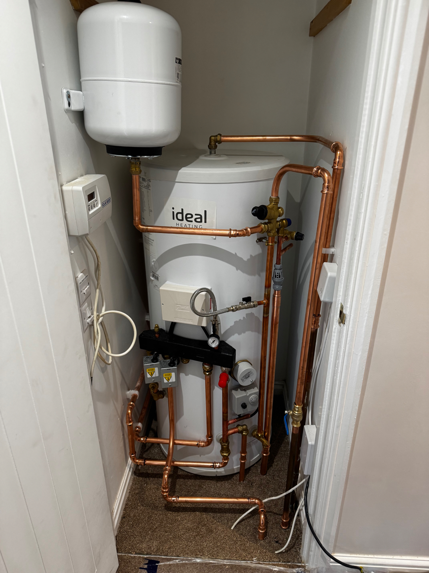 Ideal Heating unvented hot water cylinder installation with expansion vessel